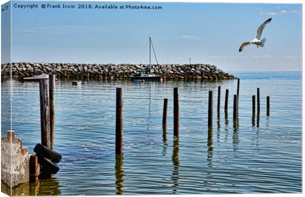 The submerged jetty at Rhos-on-Sea. North Wales. Canvas Print by Frank Irwin