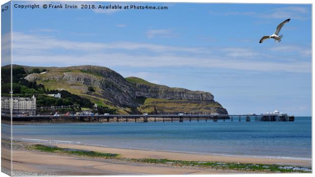 Llandudno's Great Orme and Pier. Canvas Print by Frank Irwin