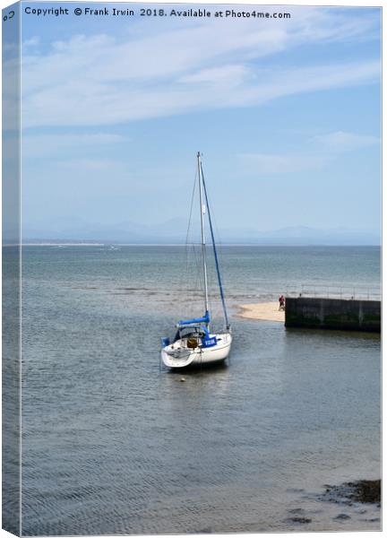A yacht lies at anchor in Abersoch Harbour Canvas Print by Frank Irwin