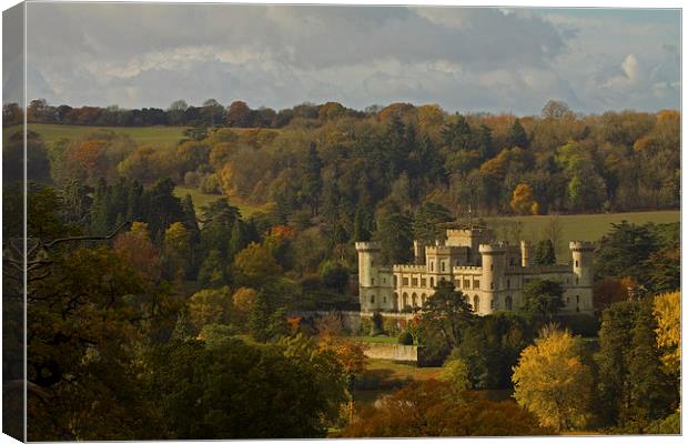 Eastnor Castle in Autumn Canvas Print by Sue Dudley