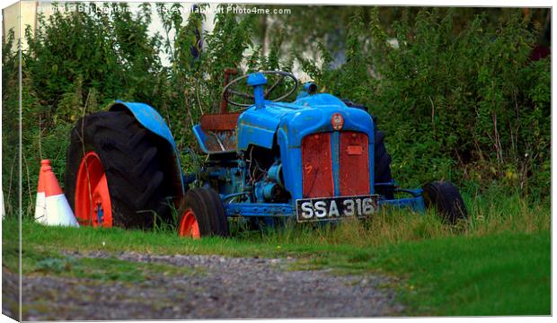  The Blue Tractor Canvas Print by Bill Lighterness