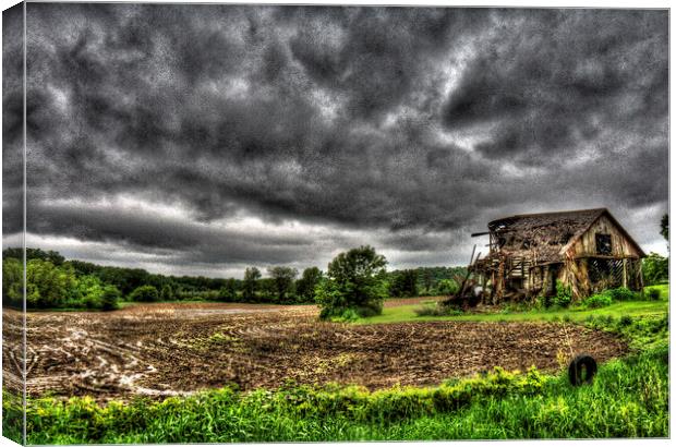 Spring Rains on Farm Ruins Canvas Print by Mayo Fottral