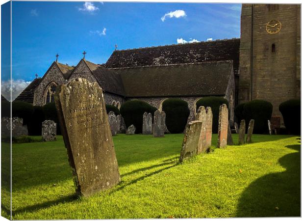 Gravestones in Churchyard Canvas Print by Peter McCormack