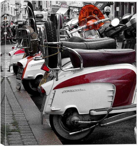 A row of Scooters Canvas Print by Paul Austen