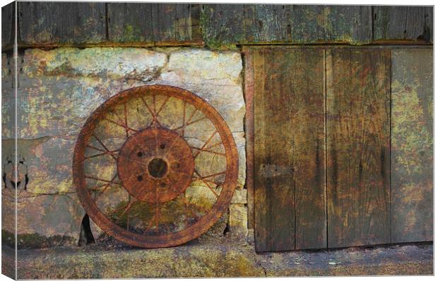 Rusty Wheel Canvas Print by Pamela Briggs-Luther