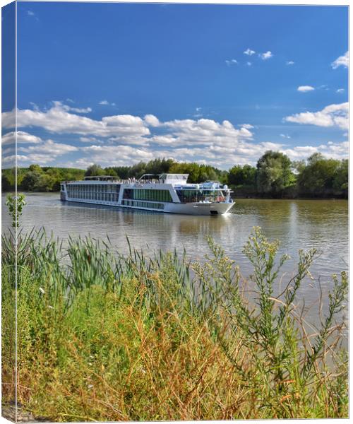 A river cruise boat in France Canvas Print by Scott Anderson