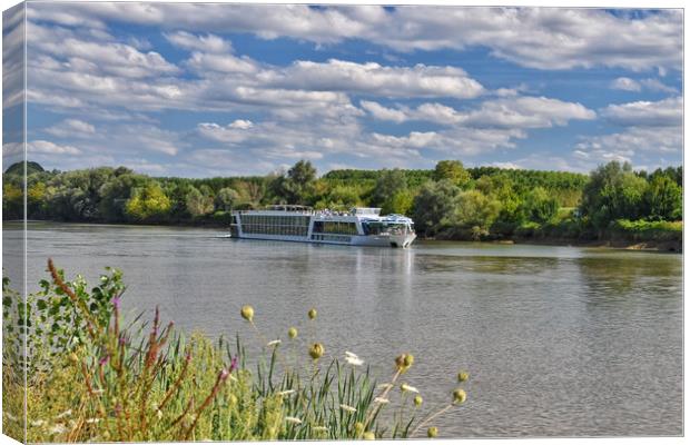 A river cruise boat in France Canvas Print by Scott Anderson