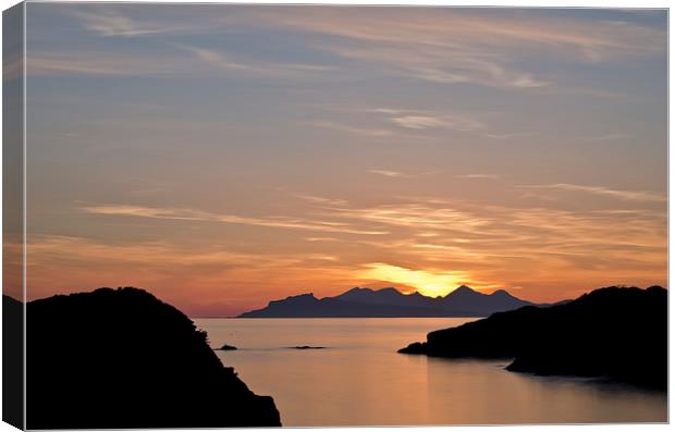 Sunset over Eigg and Rum Canvas Print by Dan Ward