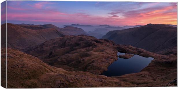 Sunrise over Sprinkling Tarn, The Lake District Canvas Print by Dan Ward