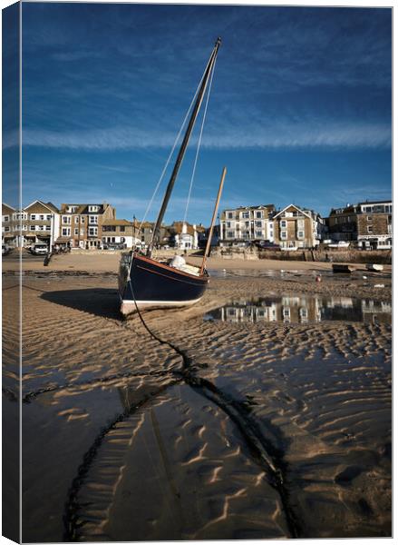 Fishing boat catching the early morning light in St Ives harbour, Cornwall Canvas Print by Dan Ward