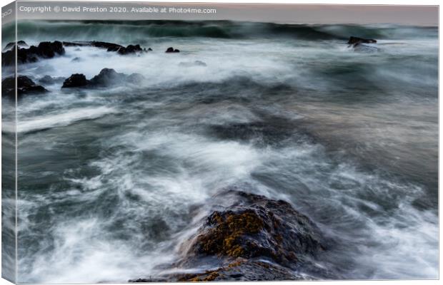 Stormy sea at Bamburgh Canvas Print by David Preston