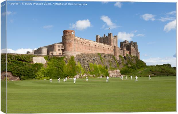 Cricket match at Bamburgh Castle Canvas Print by David Preston