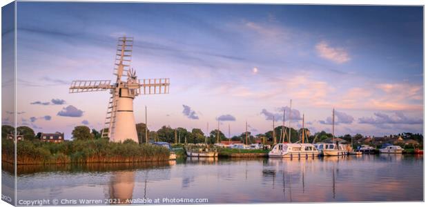 Boats moored at Thurne Windmill Norfolk Canvas Print by Chris Warren