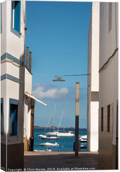 Boats in the harbour Corralejo Fuerteventura Canvas Print by Chris Warren