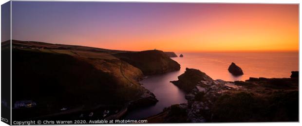 A sunset over the sea with Cornish Coastline Canvas Print by Chris Warren