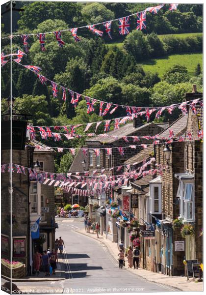 Union Jack Flags bunting flying at Pateley Bridge  Canvas Print by Chris Warren