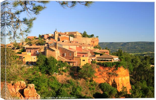 Early morning light on the village of Roussillon  Canvas Print by Chris Warren