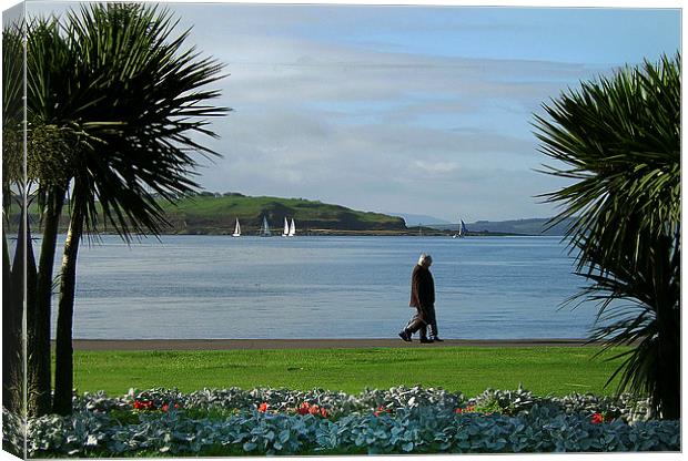 A gentle stroll along largs prom Canvas Print by Peter Mclardy