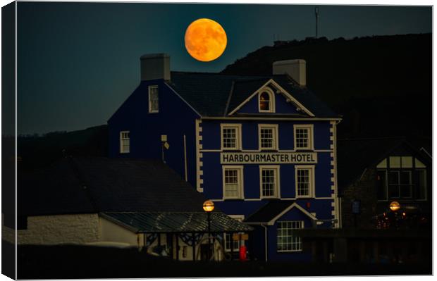 full moon over the harbor Aberaeron Canvas Print by Andrew chittock