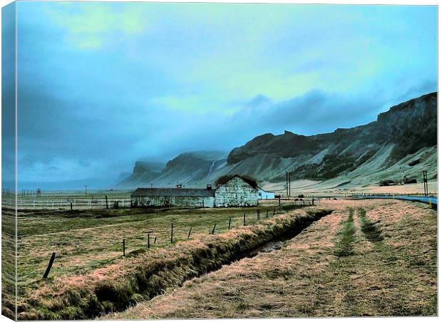 Iceland, Old Barn, Mountains Canvas Print by Robert Cane