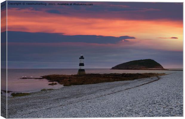 Sunrise At The Trwyn Du Lighthouse Canvas Print by rawshutterbug 