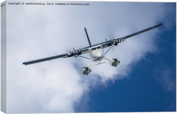 Cloud-Soaring Seaplane Canvas Print by rawshutterbug 