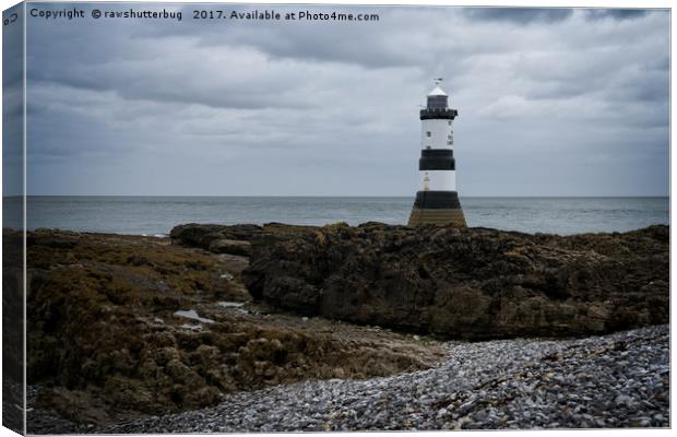 View Of The Trwyn Du Lighthouse Canvas Print by rawshutterbug 