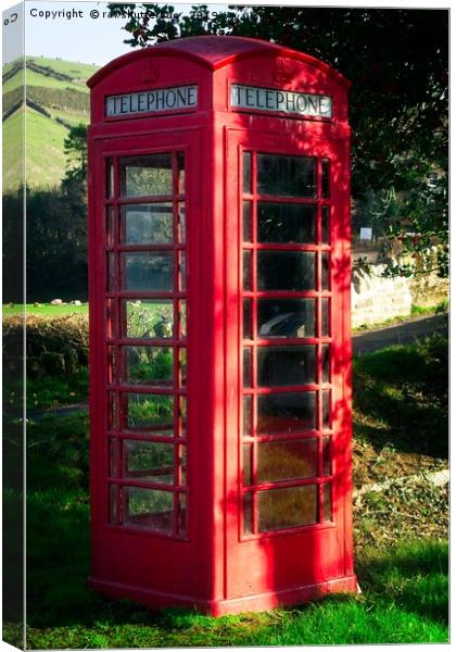 Red Telephone Box Canvas Print by rawshutterbug 