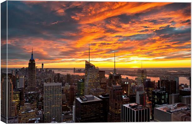 Fiery Skies over the City Canvas Print by Robert Strachan