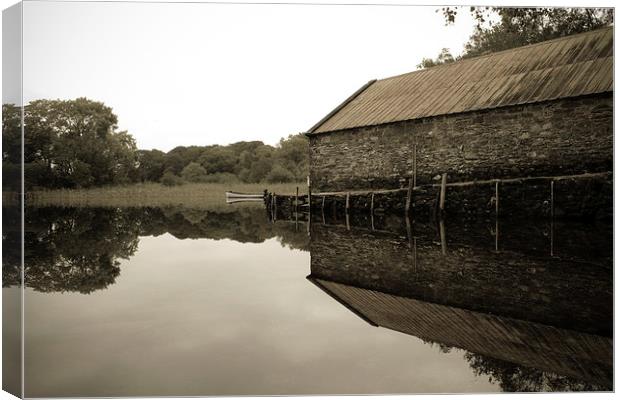 Boathouse reflection Canvas Print by Aaron Fleming
