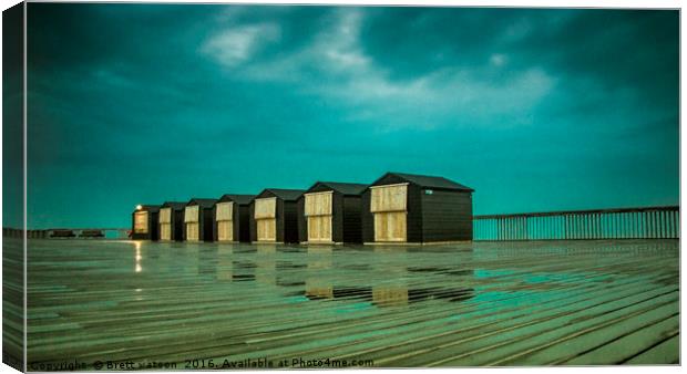 beach huts at hastings pier  Canvas Print by Brett watson