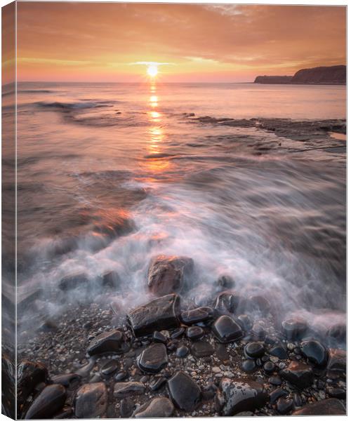 Pebbles on Kimmeridge bay at Sunset Canvas Print by Kevin Browne