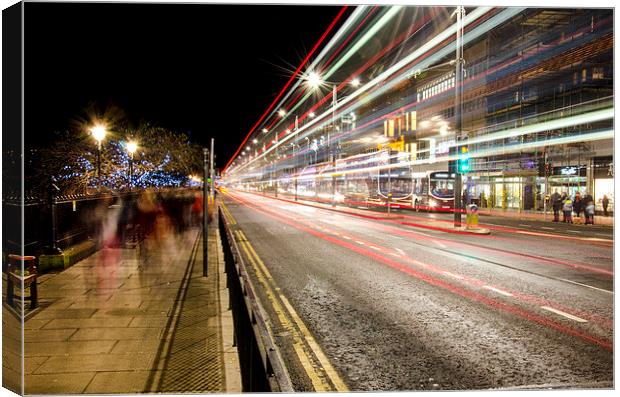 Ghosts and buses Canvas Print by Kevin Ainslie