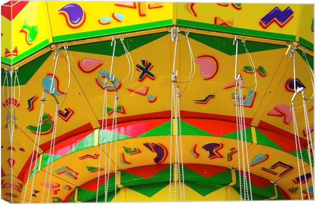 yellow carousel Canvas Print by Helen Cooke