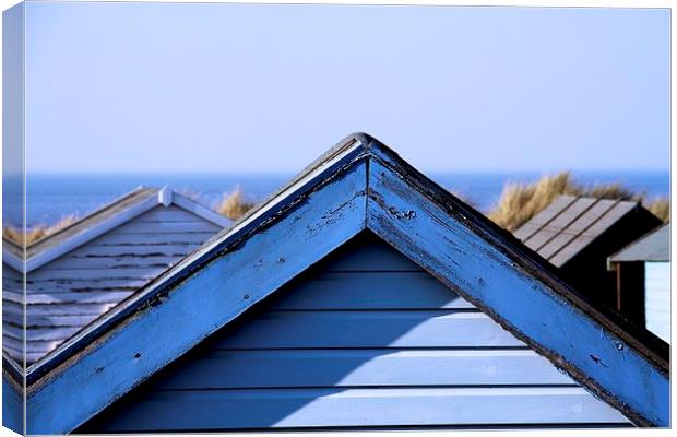 Beach huts at Old Hunstanton Canvas Print by Helen Cooke