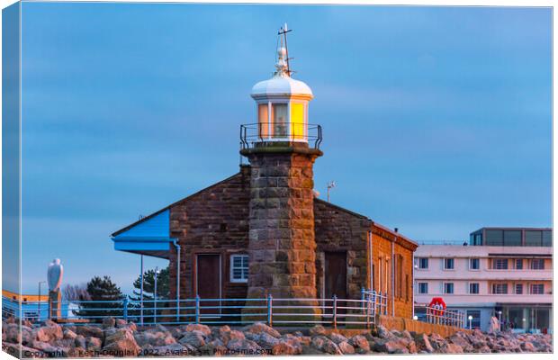 Lighthouse on the Stone Jetty Canvas Print by Keith Douglas
