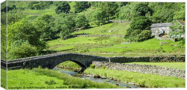 Lakeland Stone Bridge Canvas Print by Keith Douglas