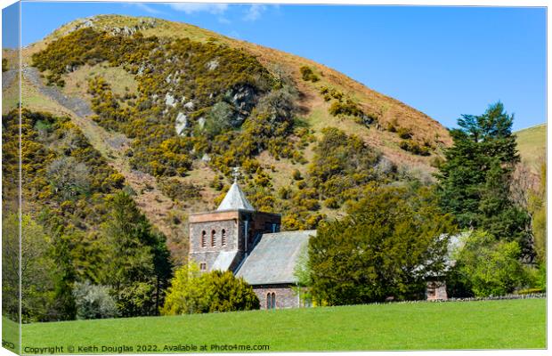 All Saints Church and Priest's Crag, Watermillock, Ullswater Canvas Print by Keith Douglas