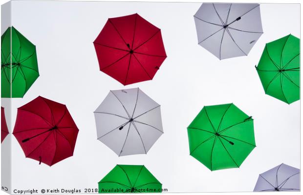 Italian Umbrellas in the sky Canvas Print by Keith Douglas