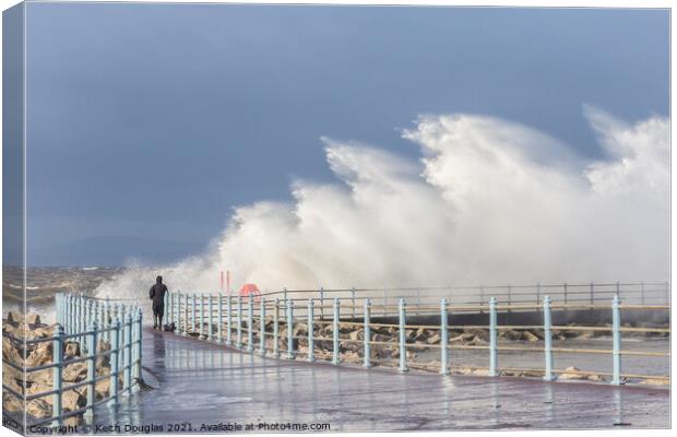 Dodging the Waves at Morecambe Canvas Print by Keith Douglas