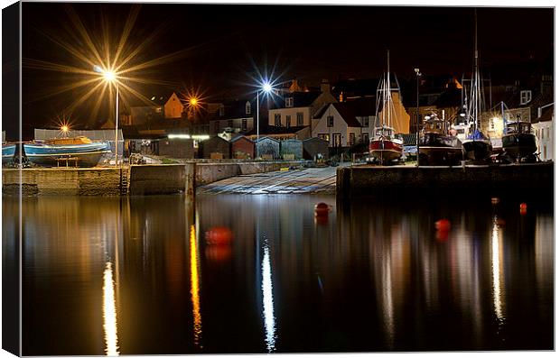 Starbursts at the Harbour Canvas Print by Lorraine Paterson