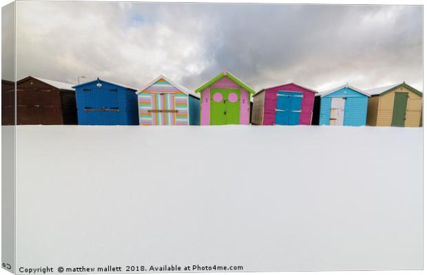 Beach Huts And Snow Canvas Print by matthew  mallett