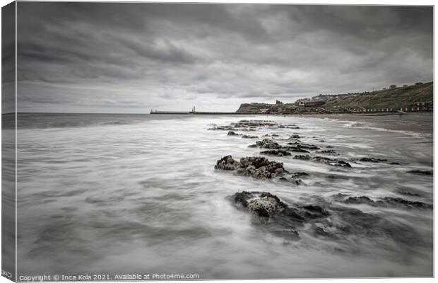 Stormy clouds over Whitby Beach Canvas Print by Inca Kala