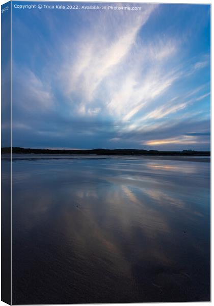 Morning Clouds Reflected on Bamburgh Beach Canvas Print by Inca Kala