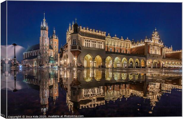 Reflections in Krakow Main Square Canvas Print by Inca Kala