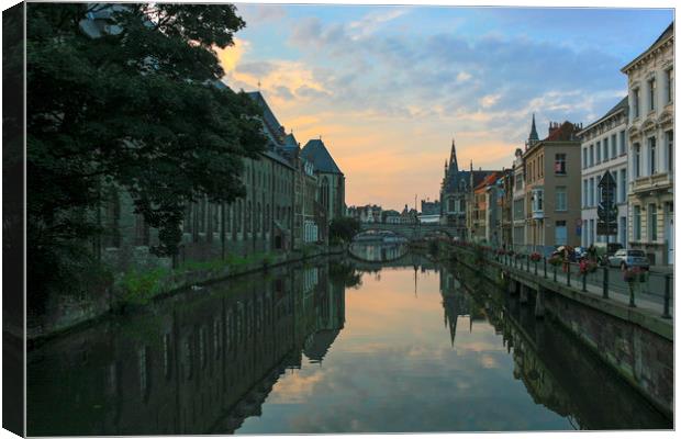 Sunset over Ghent canal Canvas Print by Mark Draper