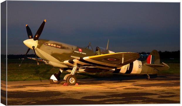 Spitfire at Night Canvas Print by Barry Burston
