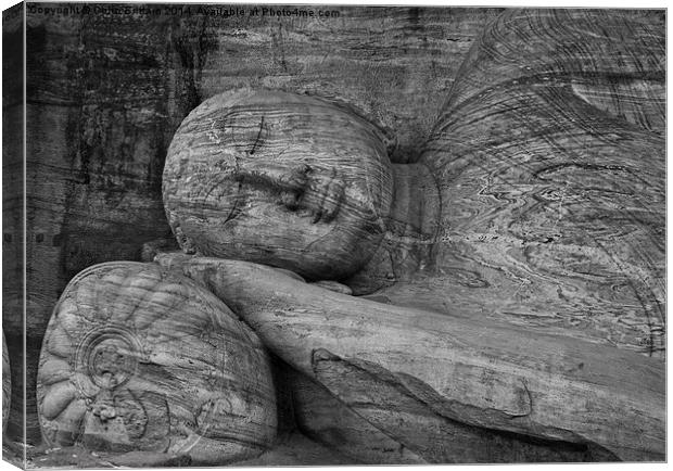  Buddha carved in stone Canvas Print by Colin Brittain
