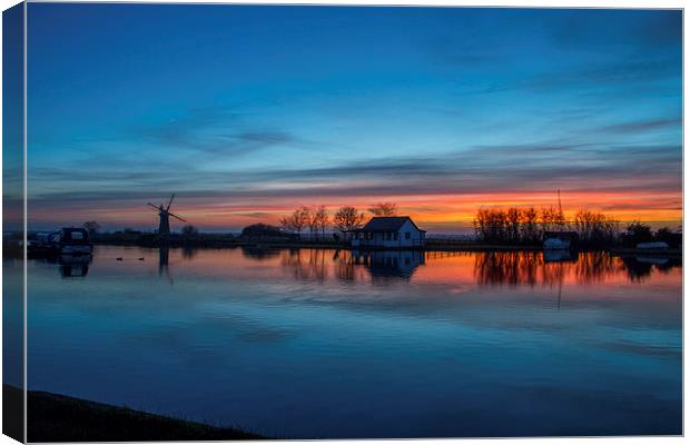 Sunset at Thurne Dyke, Norfolk Broads Canvas Print by James Taylor