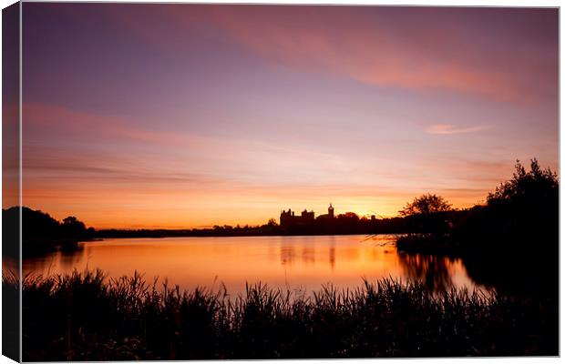 Tranquil Sunrise Over Linlithgow Palace Canvas Print by Tommy Dickson